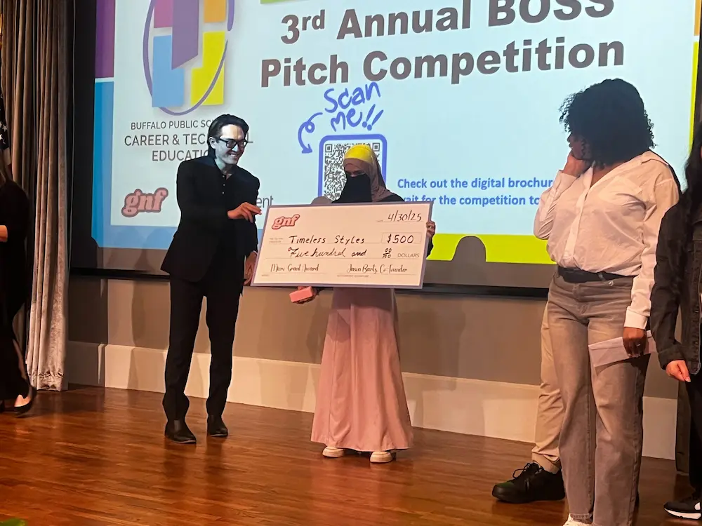 Awarding first place at the 3rd annual BOSS Pitch Competition